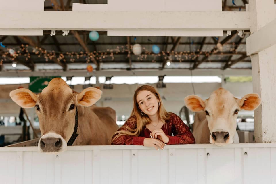 Girl with two cows